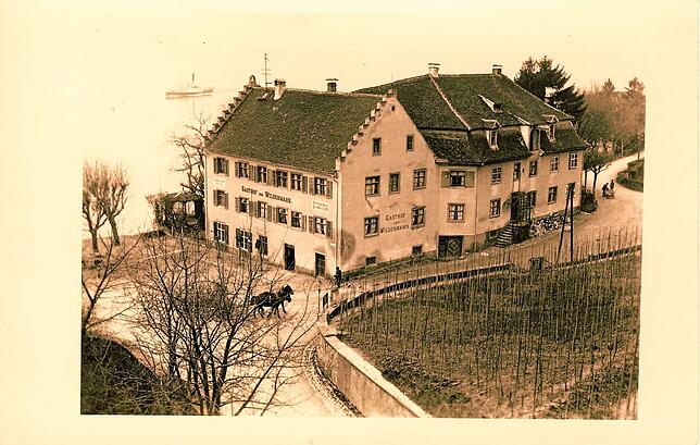 Das Hotel Wilder Mann um 1905/06. Der Name, der auf der stadtzugewandten Fassade zu lesen ist, lautete noch „Gasthof zum ...