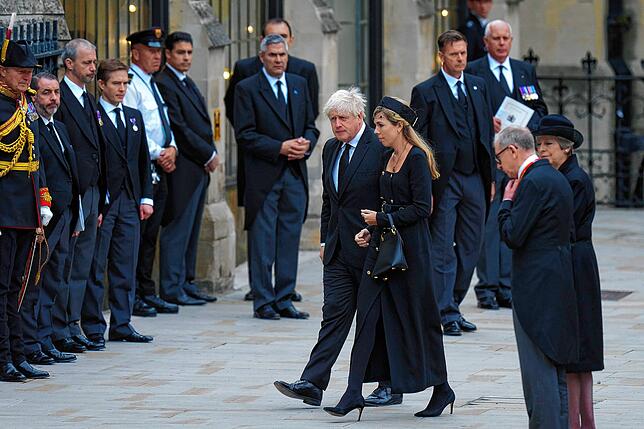 Boris Johnson, ehemaliger Premierminister von Großbritannien, und seine Frau Carrie Johnson in der Westminster Abbey.