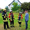 Die Zusammenarbeit von Feuerwehren und Gemeinden ist noch stärker als bisher gefragt: Das Bild zeigt nach einem Brandeinsatz in ...
