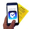 Das Logo der CovPass-App ist neben einem Impfbuch auf einem Smartphone zu sehen. Der digitale Corona-Impfpass in Deutschland soll an ...