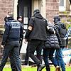 Bei der Razzia im Dezember 2022 wurden an mehreren Orten mutmaßliche Reichsbürger festgenommen, hier in Karlsruhe. Ein Teil der Gruppe ...