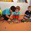 Diesen Vier- bis Fünfjährigen macht der Kindergarten Spaß. Doch die Gebühren für ihre Betreuung sind manchen Eltern zu hoch.