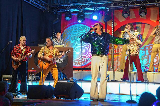 Bild 6: Papi's Pumpels: schrille Party im 70er Jahre-Look