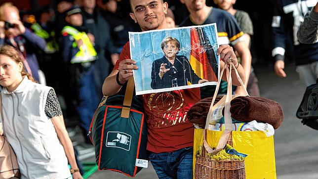 Am 5. September 2015 kommt dieser Mann am Münchner Hauptbahnhof an. Von Flüchtlingen ist zunächst die Rede &ndash; später wird das Wort ...