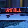 Der Schriftzug „Unfall“ ist neben dem Blaulicht auf dem Dach eines Polizeiautos zu lesen.