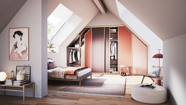 Helle Farben und ein perfekt passender Einbauschrank - so wirkt die Einrichtung im Dachgeschoss harmonisch.
