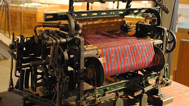 Modell eines mechanischen Webstuhls aus der Fabrik Caspar Honeggers in Rüti/CH. Honegger-Webstühle wurden weltweit verkauft und auch für ...
