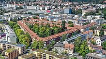 (Symboldbild) In der Mitte des sogenannten Hindenburgblocks – dem dreieckigen Gebäudeensemble (Bildmitte) – gibt es einen öffentlichen ...