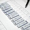 Schnelltests kleben mit Namen (verdeckt) und Uhrzeit auf einem Papier in einem Berliner Corona-Testzentrum. Mittlerweile ist bekannt, ...