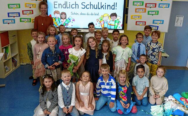 Klasse 1c: Die 26 Erstklässler mit Klassenlehrerin Judith.