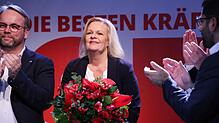 Der rote Blumenstrauß täuscht: Nancy Faeser hat für die SPD in Hessen als Spitzenkandidatin das historisch schlechteste Ergebnis ...