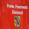 Aufschrift mit Stockacher Wappen an einem der Fahrzeuge der Stockacher Feuerwehr.