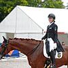 Im Regen von Donaueschingen ein Lächeln: die Bräunlingerin Anika Scherzinger auf ihrem Pferd van Helsink nach erfolgreich absolvierter ...