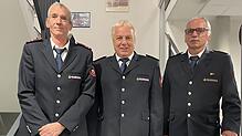 Ehrenspange in Silber für Heiner Prüsse und Ullrich Müller mit Kommandant Hubert Specker (von links).