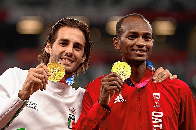 Historisch: Der Italiener Gianmarco Tamberi (links) und Mutaz Essa Barshim aus Katar teilen sich im Hochsprung Gold.