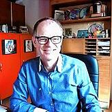Wolfgang Aich im Homeoffice aus der Webcam-Perspektive.