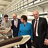 Schwerins Oberbürgermeister Rico Badenschier (von rechts), ZIM-Geschäftsführer Peter Zimmermann, Bundeswirtschaftsministerin Brigitte ...