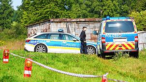 Das abgesperrte Gebiet im Westerwald, in dem die Leiche des gesuchten Dreifach-Mörders gefunden wurde.