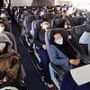 Der Mundschutz gehört inzwischen zum gewöhnlichen Bild bei Passagieren, die von China nach Frankfurt reisen.