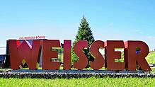 Der Firmenschriftzug der Firma J.G. Weisser an der Bundesstraße. Obwohl das Unternehmen aktuell in Insolvenz in Eigenverwaltung ist, ...