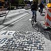 &bdquo;Ach Fuß&ldquo; mehr ist zurzeit mehr bei dem großen Warnhinweis auf dem Rad- und Fußweg an der Konzilstraße zu lesen.