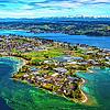 Blick über die Insel Reichenau in Richtung Schweiz mit den Alpen