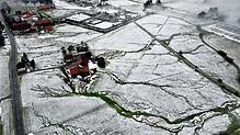 Weiler im Allgäu: Winterlich sieht die Landschaft aus der Vogelperspektive aus, nachdem ein heftiger Hagelschauer niedergegangen ist.