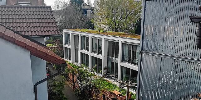 Nachverdichtung in den Hinterhöfen der Hüetlinstraße, links die Gebäude auf dem großväterlichen Schreinergelände der Familie Rebholz, ...