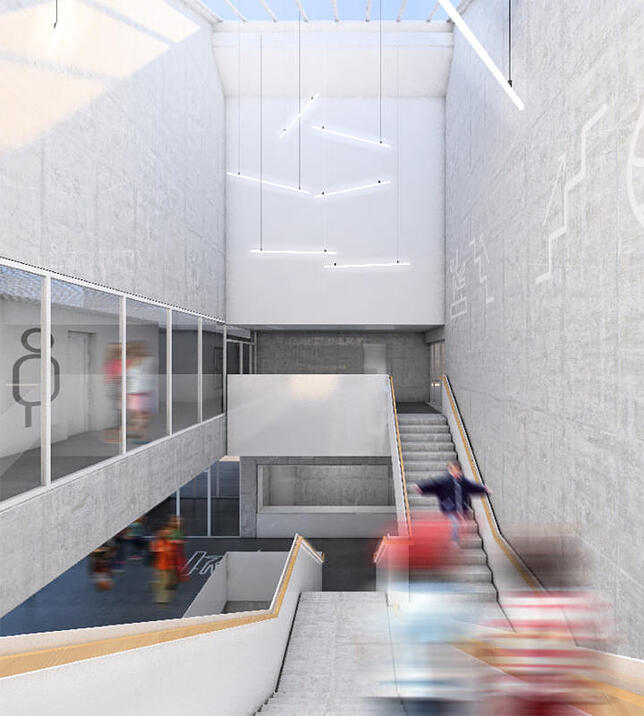 Das Treppenhaus wirkt durch ein Glasdach noch offener. Bild: Wulf Architekten