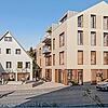 So stellen sich die Architekten die Südseite des Areals mit der neuen Sparkassenfiliale künftig vor. Vorn die Ortsdurchfahrt ...