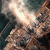 Ein Satellitenfoto zeigt das Atomkraftwerk Fukushima I wenige Sekunden nach einer Explosion in Reaktor 3, aufgenommen am 14. März 2011.