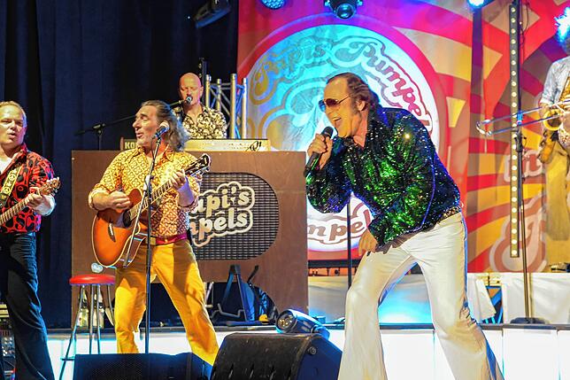 Bild 18: Papi's Pumpels: schrille Party im 70er Jahre-Look