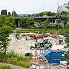 Auf der Baustelle für das Asisi-Panorama wird auch am Mittwoch, 10. Juli, kräftig gewerkelt. Bald soll das Gebäude auch in die Höhe wachsen.
