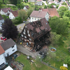 Die Drohnenaufnahme vom Samstag, 24. Mai, zeigt das Ausmaß der Zerstörung. Nach dem Brand in der Nacht zum Samstag ist das Gebäude im ...