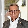 Für den Aacher Bürgermeister Manfred Ossola ist die erste Hälfte der Amtszeit vorbei. Für das Bild hat er die Corona-Maske kurz abgelegt.