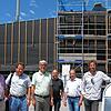 Die Reichenauer Markthalle (hinten) soll Mitte August eröffnen. Im Bild die Macher (von links): die Indigo-Geschäftsführer Andreas ...