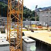 Am Jahnplatz zwischen Bahnhof und Innenstadt entstehen zwei große Stadthäuser. Bild: VN/Gernot Schweigkofler