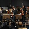Das Konzert, ein Maskenball: Musiker der Südwestdeutschen Philharmonie mit Mund- und Nasenschutz.