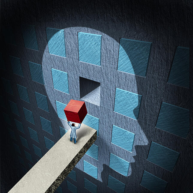 Ein Symbol für das Konzept der Psychotherapie: Ein Arzt versucht, das menschliche Gehirn zu reparieren.