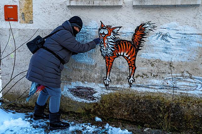 Graffiti an einer Wand der alten SABA-Gebäude. Grafitti-Künstlerin Isoki grault den von ihr erschaffenen Kater.