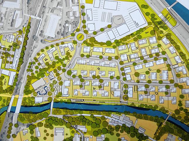 Entwurf des zukünftigen Wohnquartiers, das an der Stelle der ehemaligen Papierfabrik entstehen soll. Der Plan ist geostet, im unteren ...