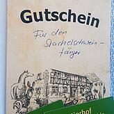 Der Gutschein der Reutemühle mit der Notiz: Für den Stachelschweinfänger.