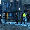 Polizisten stehen vor einem Gebäude der Zeugen Jehovas in Hamburg. Bei Schüssen in einer Veranstaltung der Zeugen Jehovas sind am ...