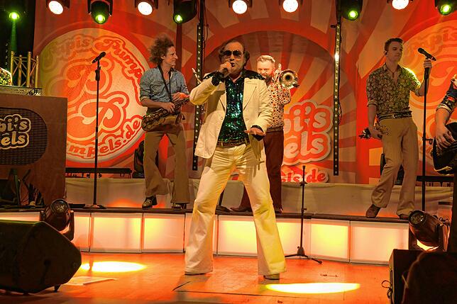 Bild 30: Papi's Pumpels: schrille Party im 70er Jahre-Look