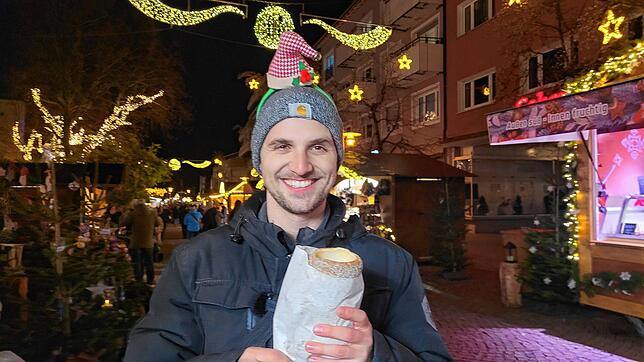 Der Baumstriezel ist ein süßer Klassiker auf einem Weihnachtsmarkt.