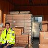 Hussain Helal, einer der Mitarbeiter des Bauhofs, vor einer Garage, in der Betten, Matratzen und Zubehör gelagert werden. Diese werden ...