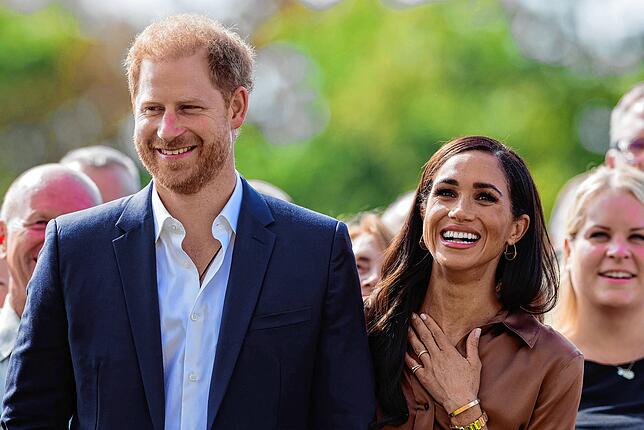 Prinz Harry, Herzog von Sussex, und seine Frau Meghan, Herzogin von Sussex. Bild: dpa