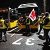 Teilnehmer des Warnstreiks im öffentlichen Nahverkehr stehen in einem Busdepot der Stuttgarter Straßenbahnen AG.