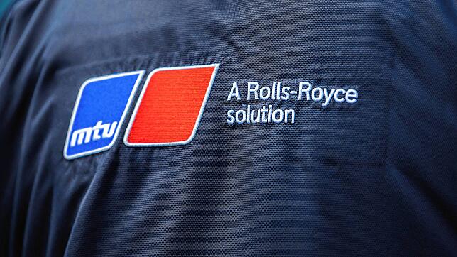 Das Logo der RRPS-Marke MTU auf einer Jacke. Wann kommen Aufträge? Bild: dpa