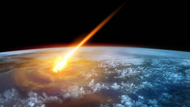 In der Darstellung steht ein Meteorit kurz vor dem Eintritt in die Erdatmosphäre, die den Planeten vor dem Himmelskörpern schützt, weil ...